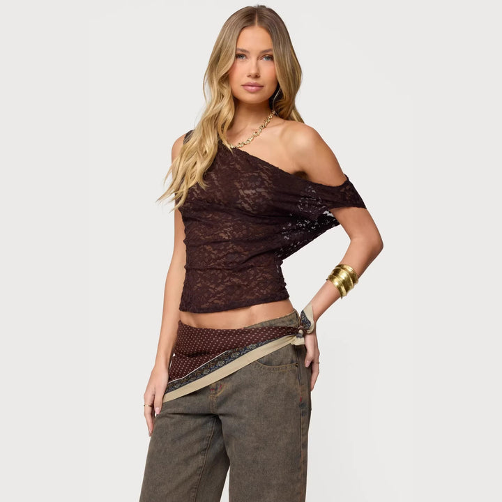 Dame blonderbluse med asymmetrisk design og løs passform Skjora