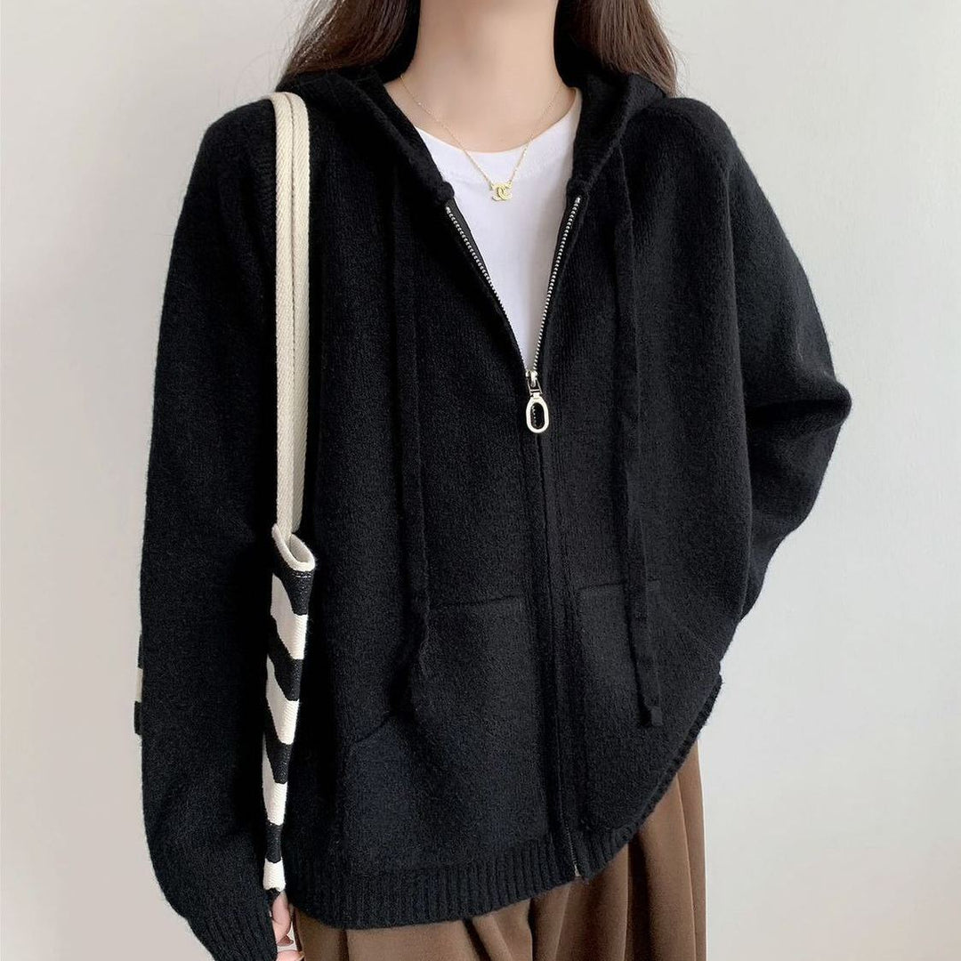 Damenes oversized hettegenser med kort snitt og praktiske lommer Skjora