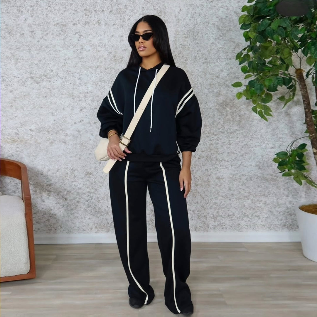 Dame sporty loungewear-set med oppbrettede ermer og sidestreker Skjora
