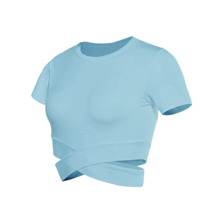 Dame kortermet trenings-crop-top med innovativt draperingsutseende Skjora