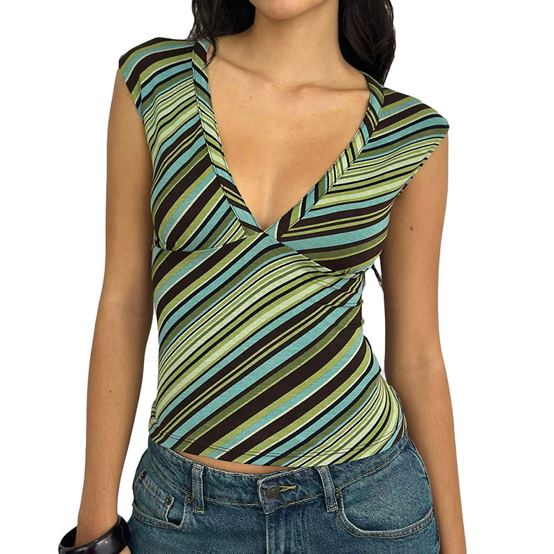 Dame figurvennende innpakningsoverdel med dyp V-hals og modisk stripemønster Skjora
