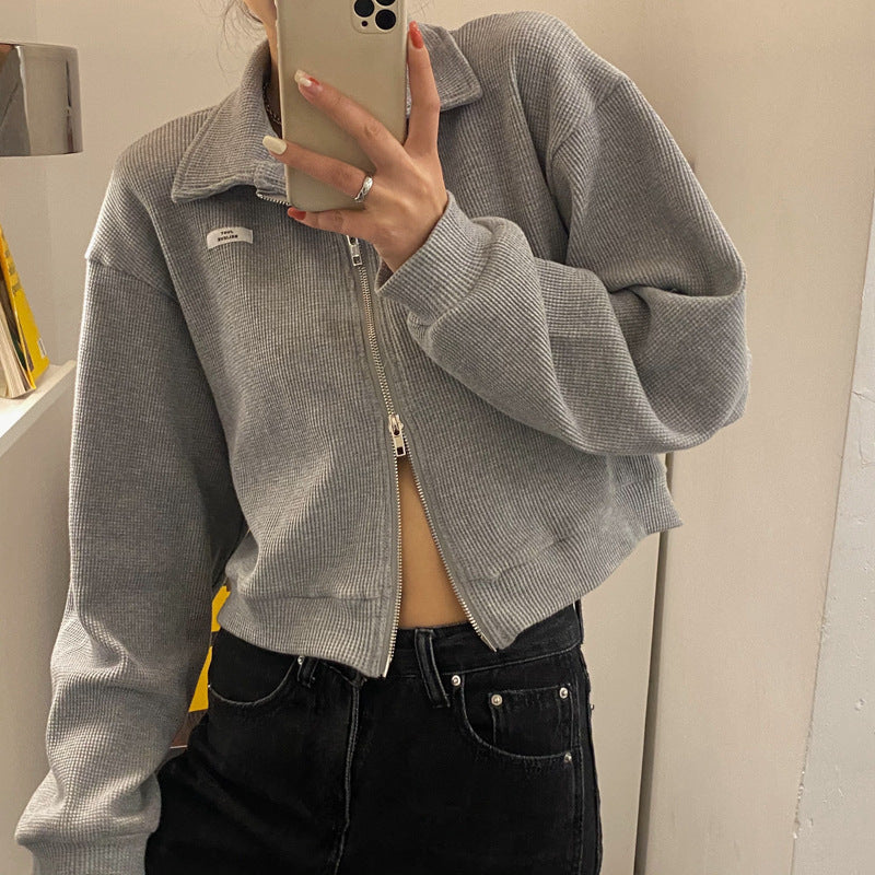Damer cropped fleecejakke med moderne glidelås og avslappede ermer
