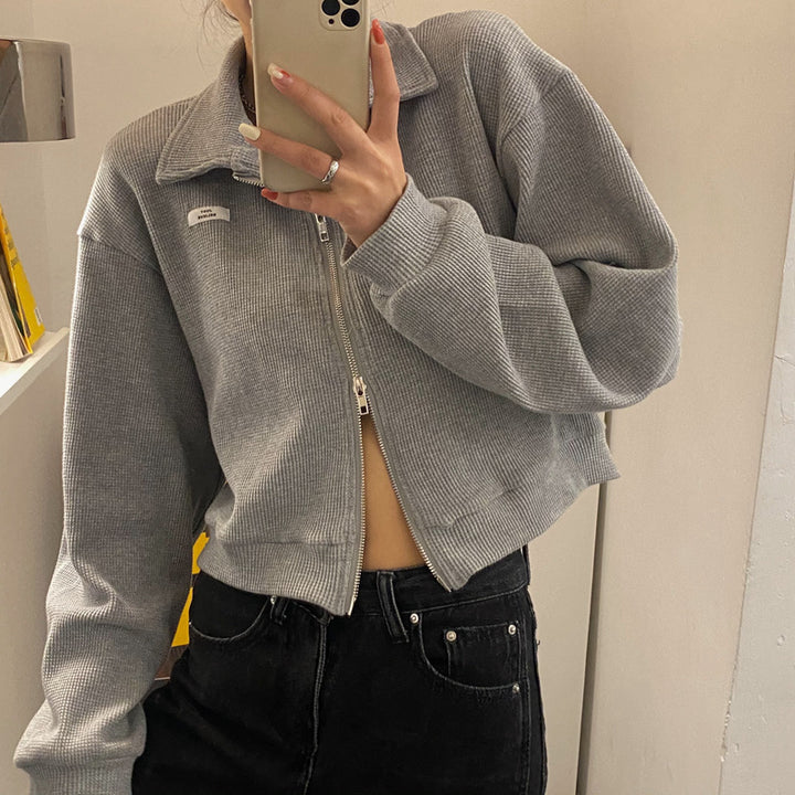 Damer cropped fleecejakke med moderne glidelås og avslappede ermer