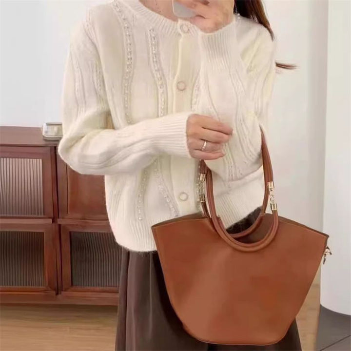 Dame cardigan med elegante perledetaljer og klassisk snitt Skjora