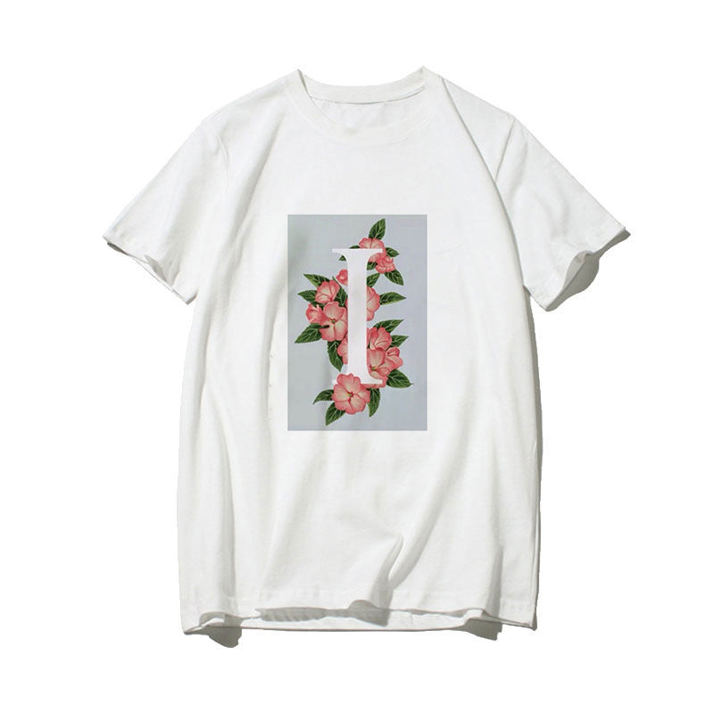 Dame T-skjorte med blomsterdesign og kreativt trykk Skjora