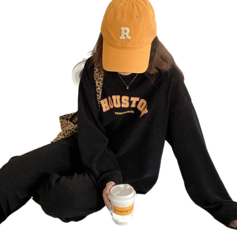Kvinnens komfortable oversized sweatshirt-bukse kombinasjon Skjora