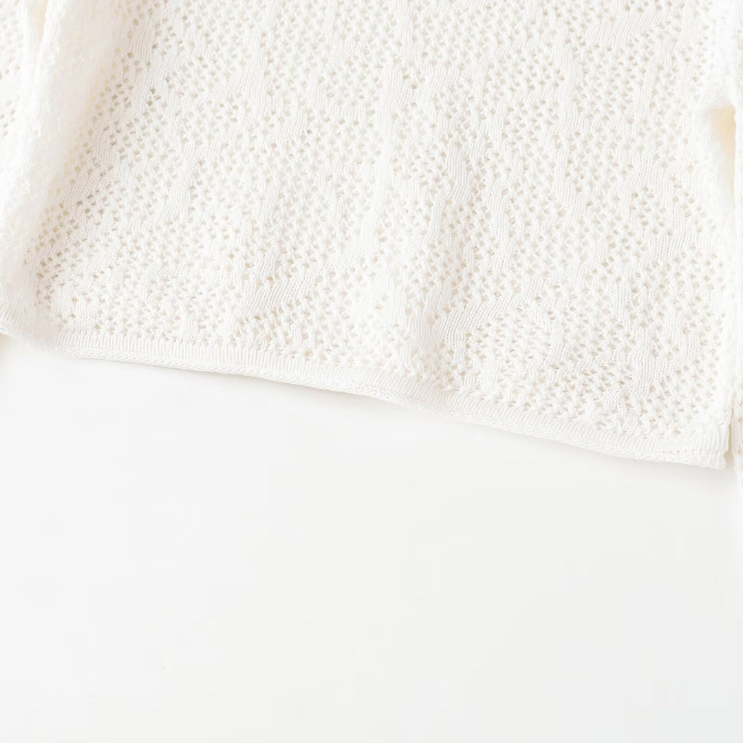 Dame Cropped Strikketopp med elegant lengdemønster Skjora