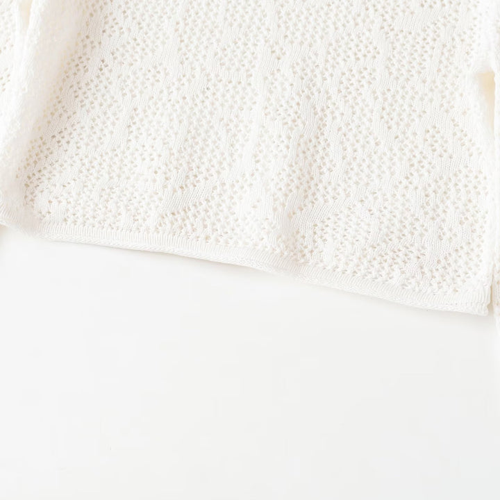 Dame Cropped Strikketopp med elegant lengdemønster Skjora