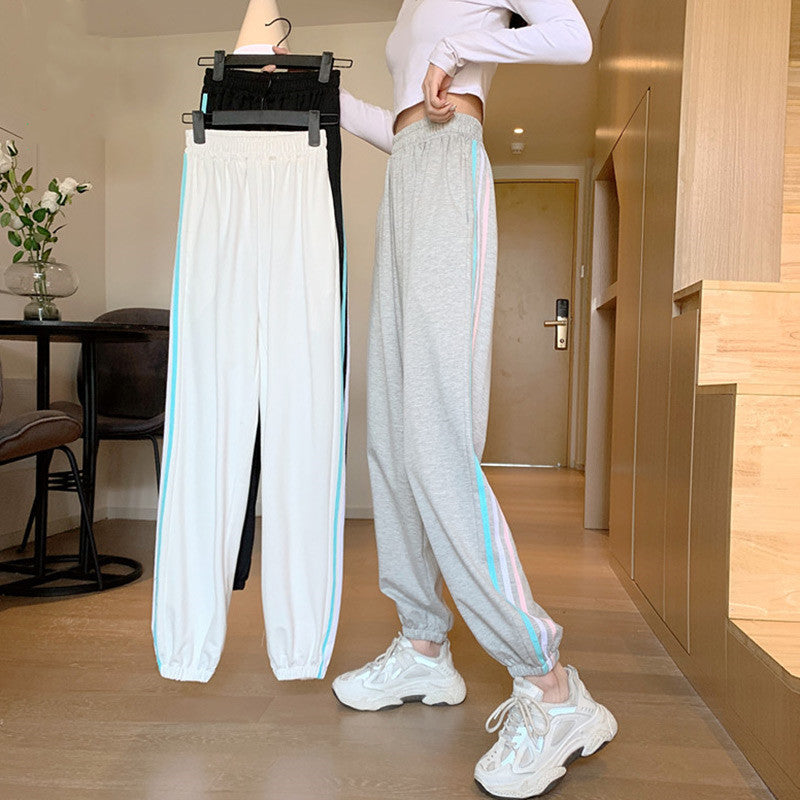 Dame sporty joggebukser med stilige sideninsert Skjora