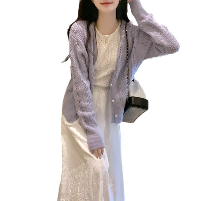 Dame cardigan med delikat mønster og knappdetaljer Skjora