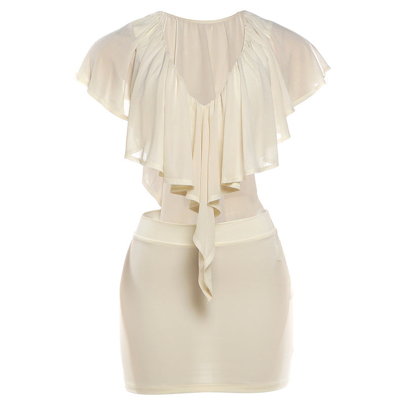 Dame elegant bluse med voluminøse flæsedetaljer og stilig ryggutskjæring Skjora