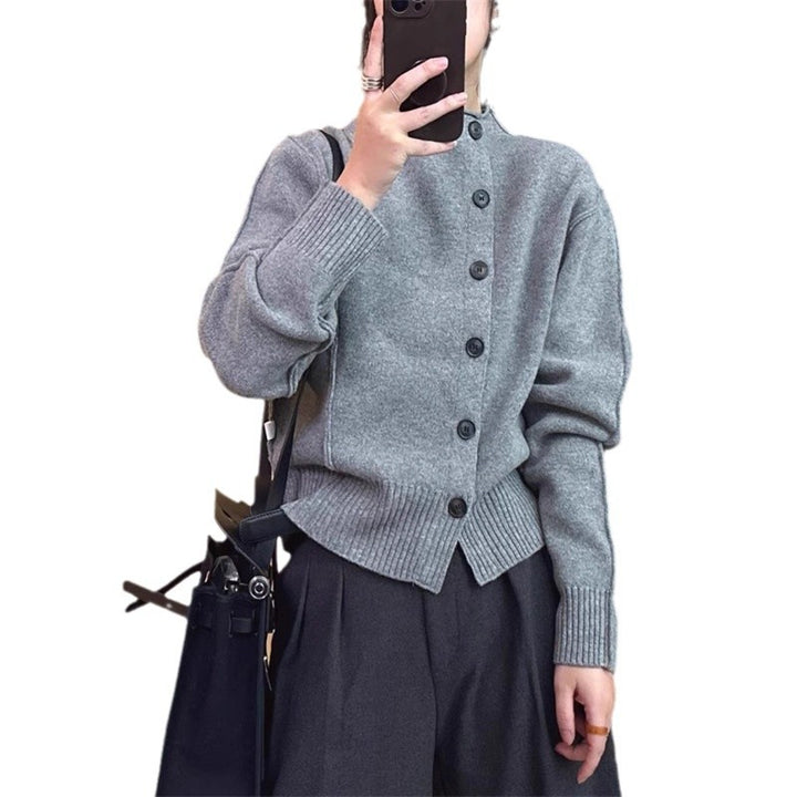 Dame cardigan med knappeåpning og ribbede detaljer Skjora