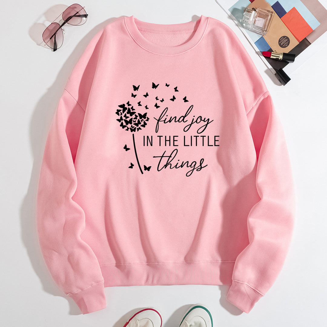 Kvinnegenser med motiverende slogan og blomsterprint Skjora