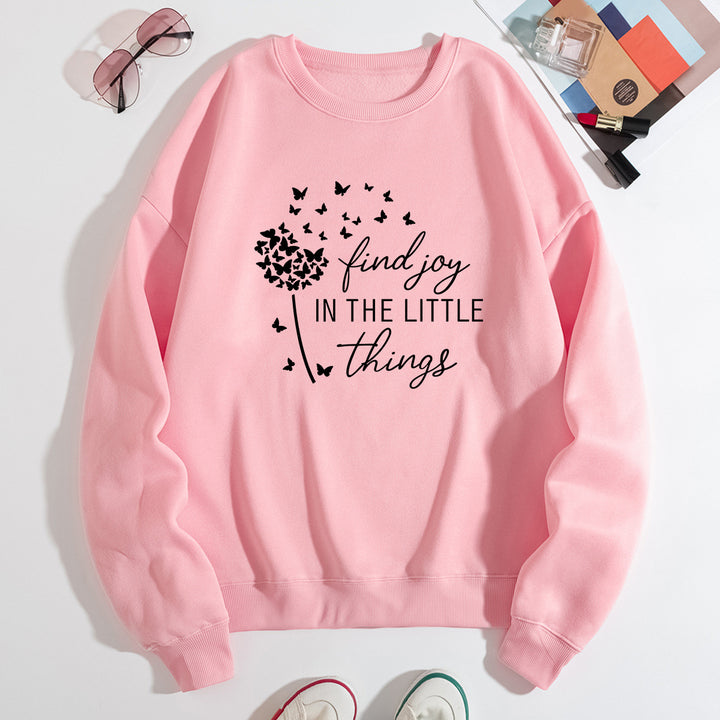 Kvinnegenser med motiverende slogan og blomsterprint Skjora