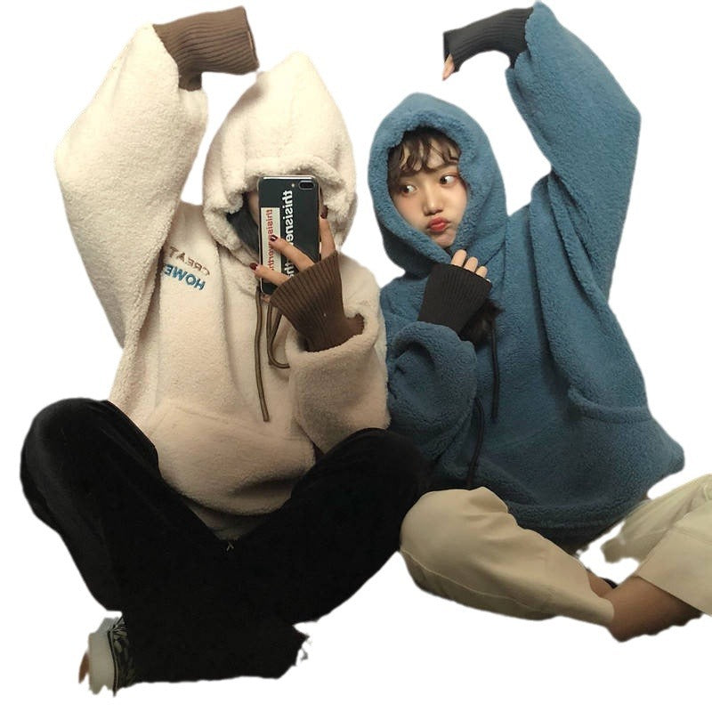 Damer's koselige oversized hettegenser med front kengurulomme og elastiske mansjetter Skjora