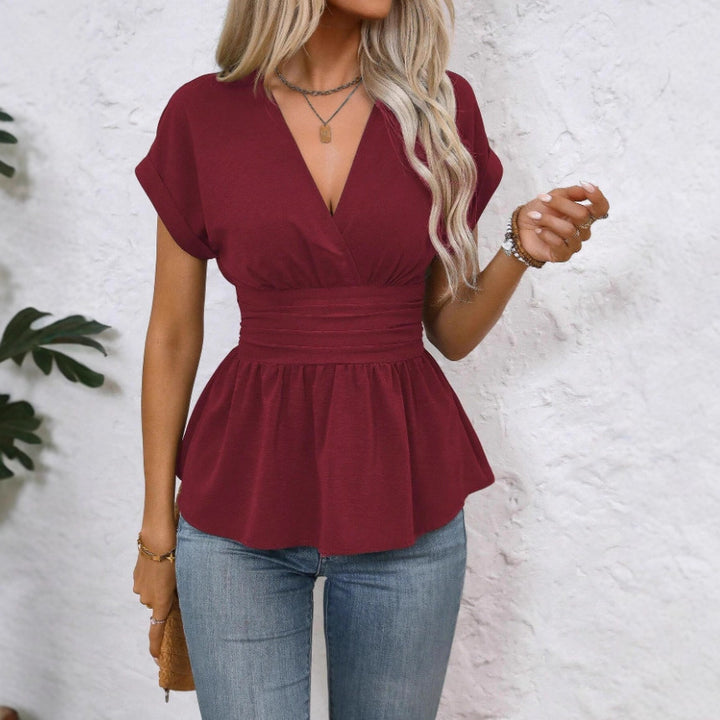 Dame Peplum-bluse med V-hals og belte i midjen Skjora