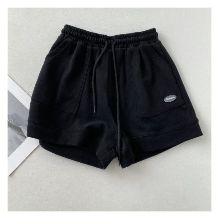 Kvinnenes casual joggeshorts med elastisk liv og praktiske sidelommer