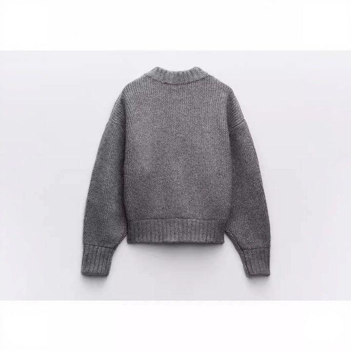 Kvinnes moderne cardigan med voluminøse ermer og glidelås Skjora