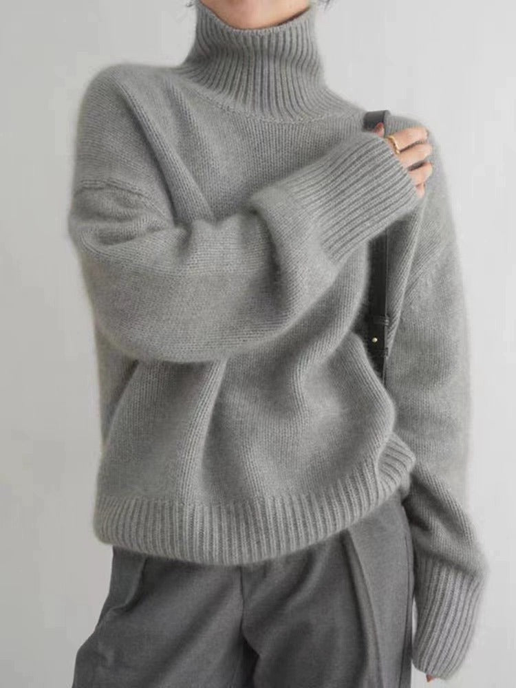 Kvinnes cashmere rullehalsgenser med løs passform og elegant tekstur Skjora