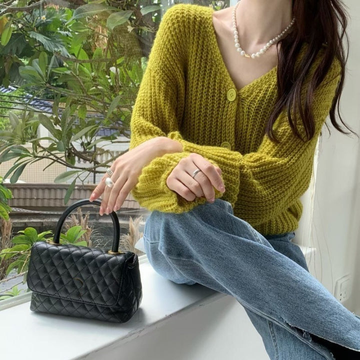 Dame cardigan med overdimensjonerte ermer og knappdetalj Skjora