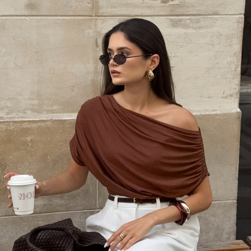 Women's asymmetrical top with relaxed draped design Skjora