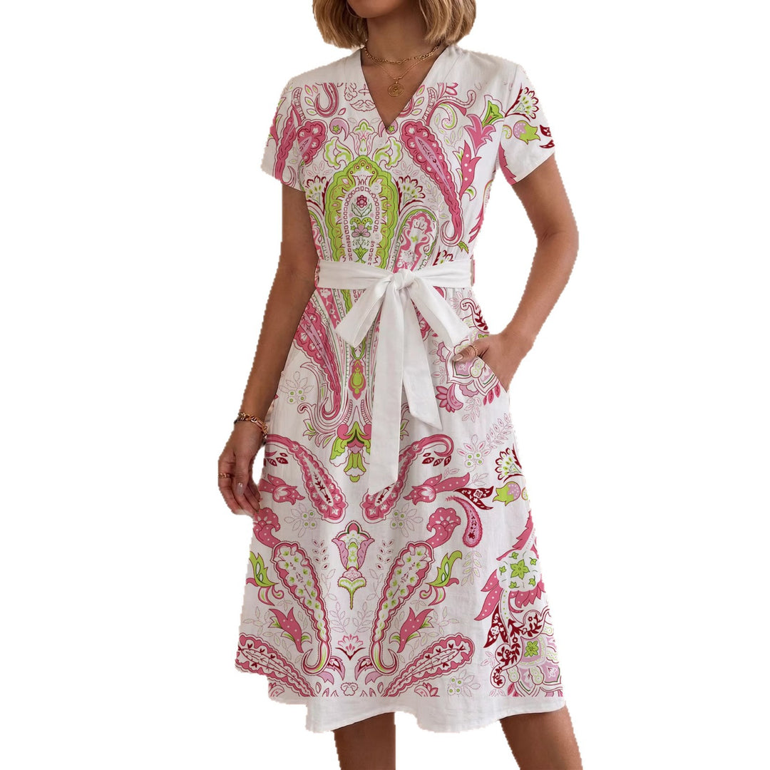 Dame Midi kjole med florale akcentuer og innsnevret snitt Skjora