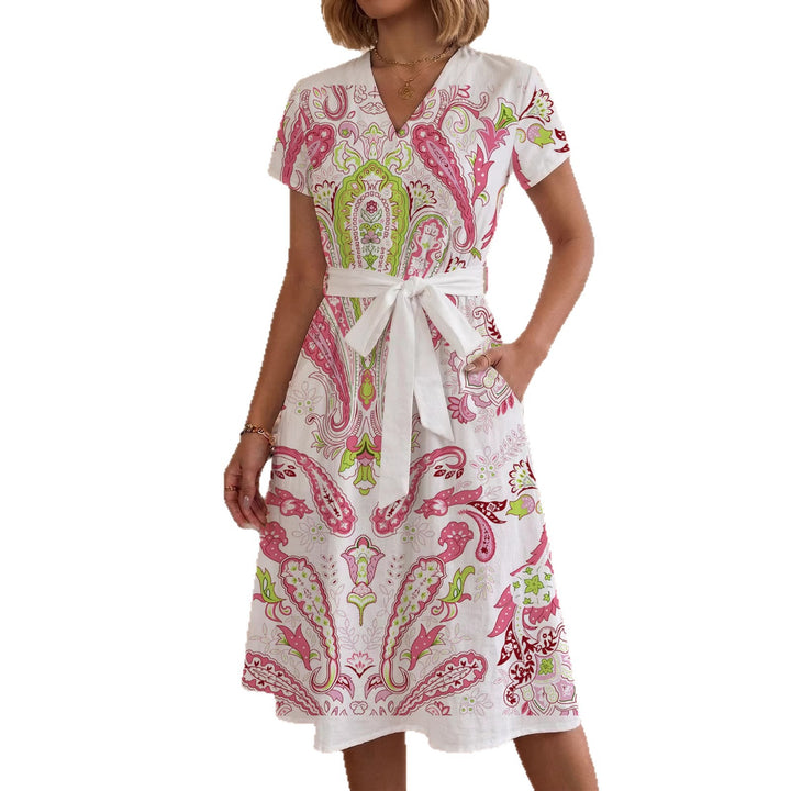 Dame Midi kjole med florale akcentuer og innsnevret snitt Skjora