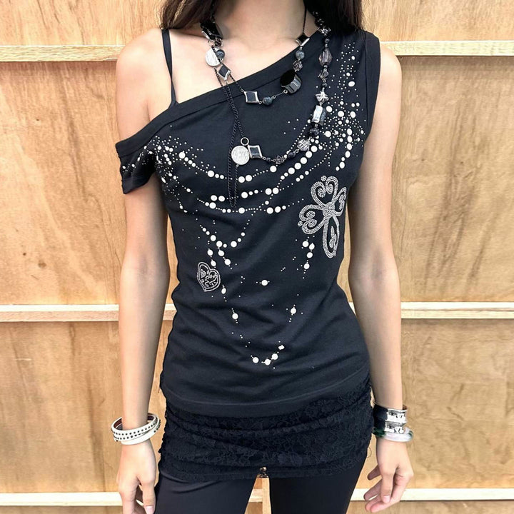 Dame asymmetrisk tanktop med stilig trykk og dekorative applikasjoner Skjora