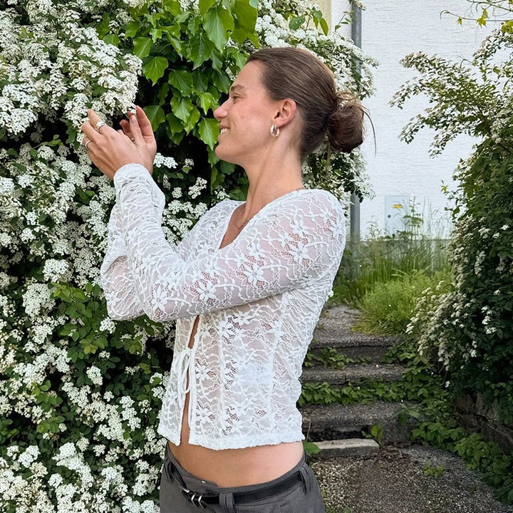 Dame spissbluse med elegant snøring Skjora