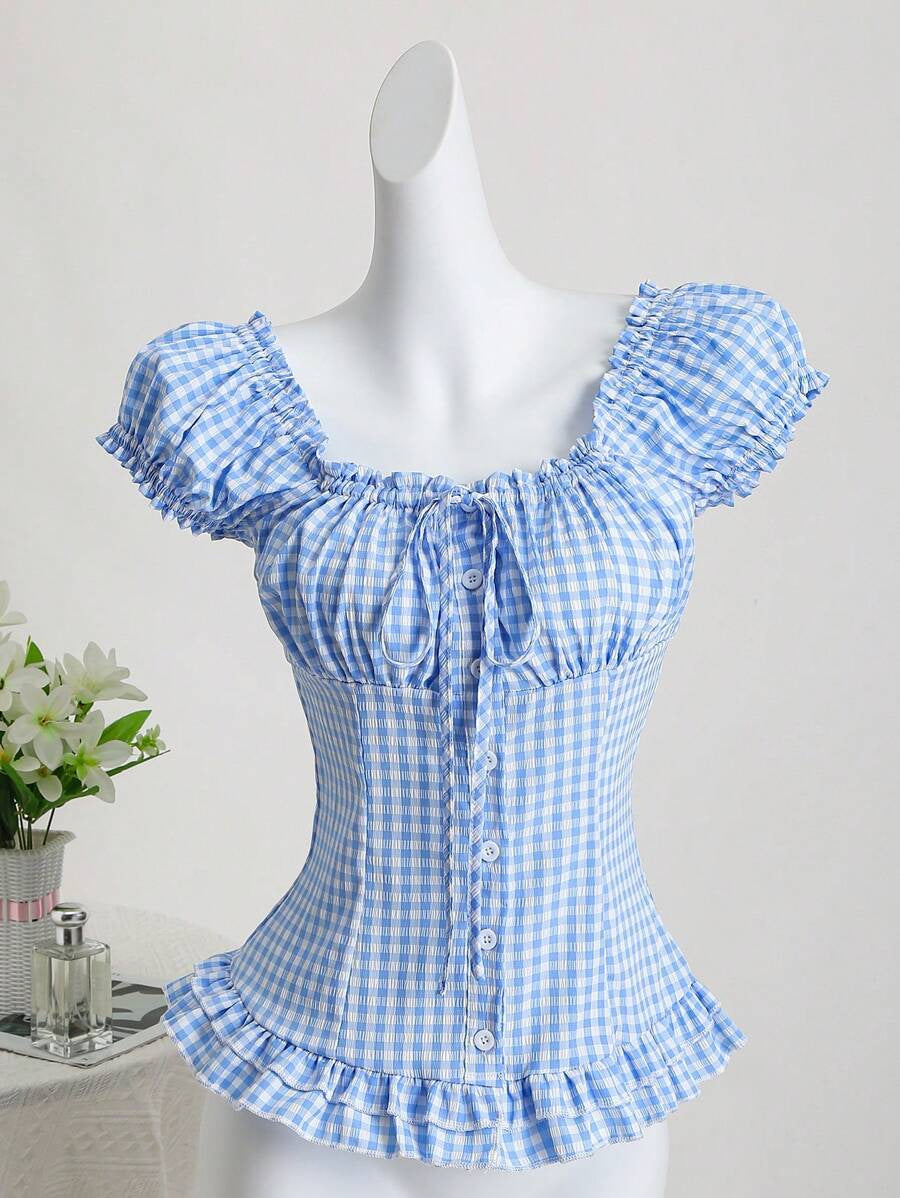 Dame ruffled topp i rutete design med knappdetaljer og elastisk fald Skjora