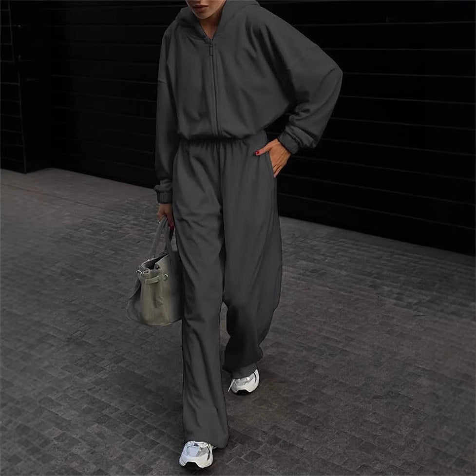Kvinnenes koselige fleece jumpsuit med hette og praktiske lommer Skjora