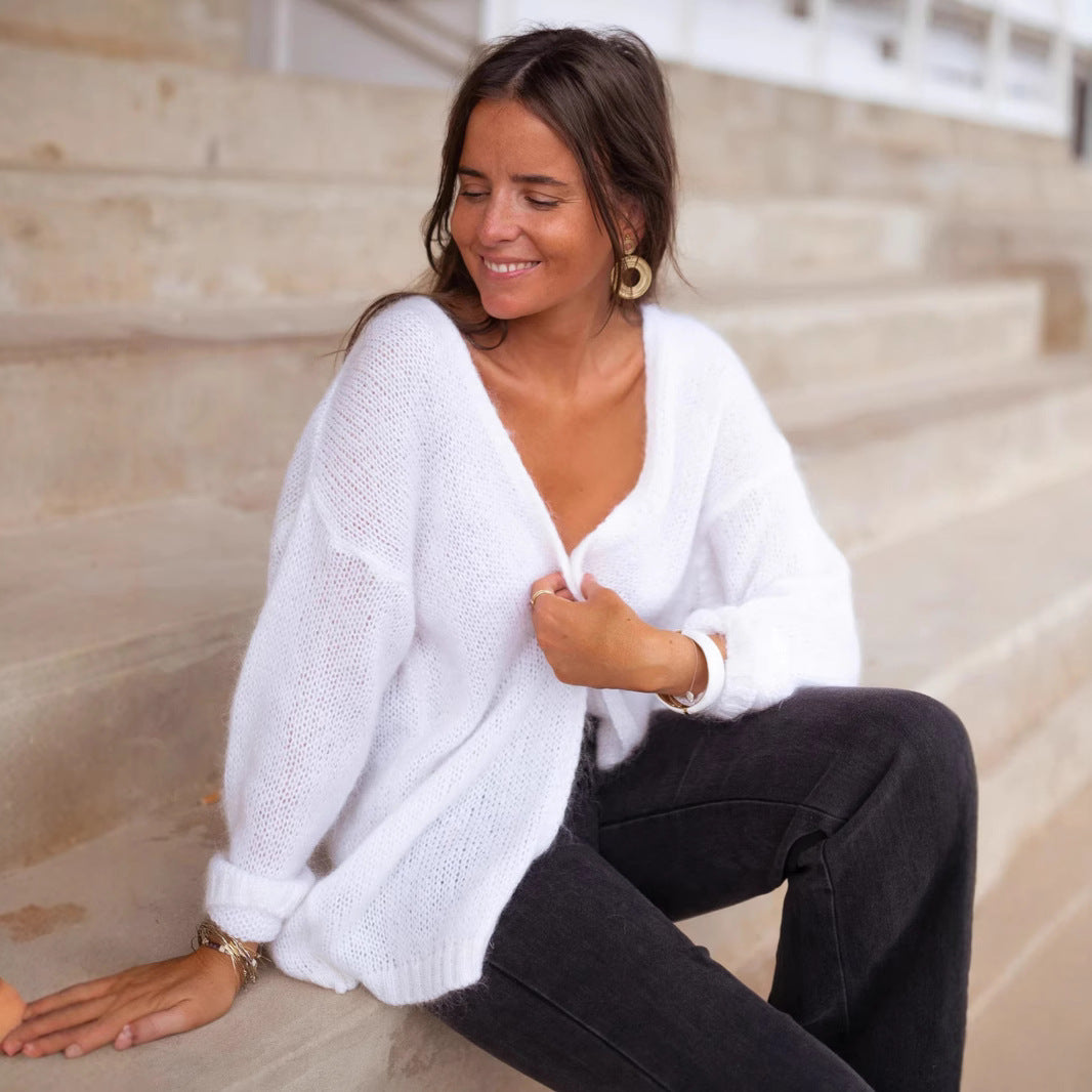 Kvinne cozy oversized genser med dyp V-hals og myk tekstur Skjora