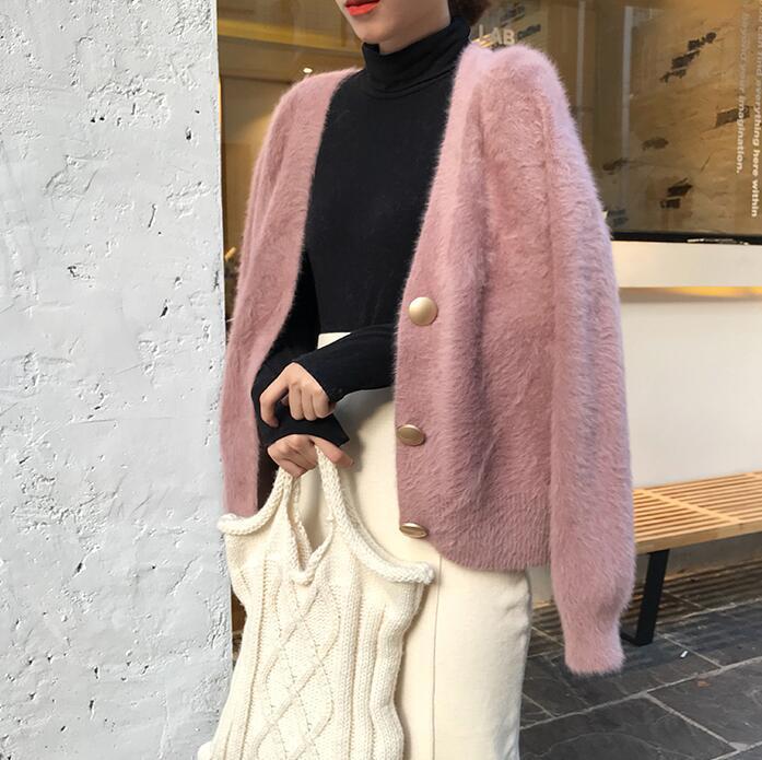 Kvinnens koselige cardigan med store knapper og oversized passform Skjora