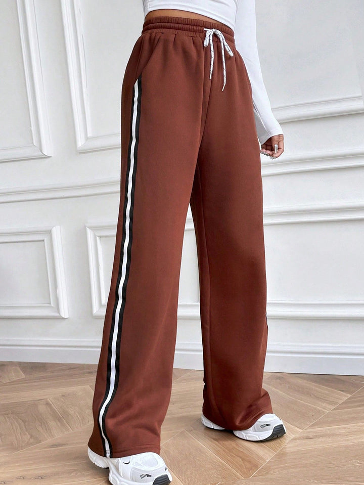 Kvinne casual joggebukser med vid ben og kontraststriper Skjora