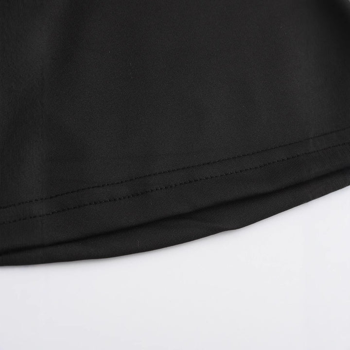 Dame Crop-T-skjorte med iøynefallende trykk og tettsittende design Skjora