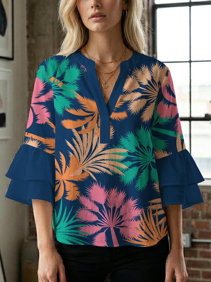 Dame bluse med voluminøse rysjermer og moderne motiv Skjora