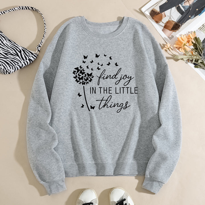 Kvinnegenser med motiverende slogan og blomsterprint Skjora