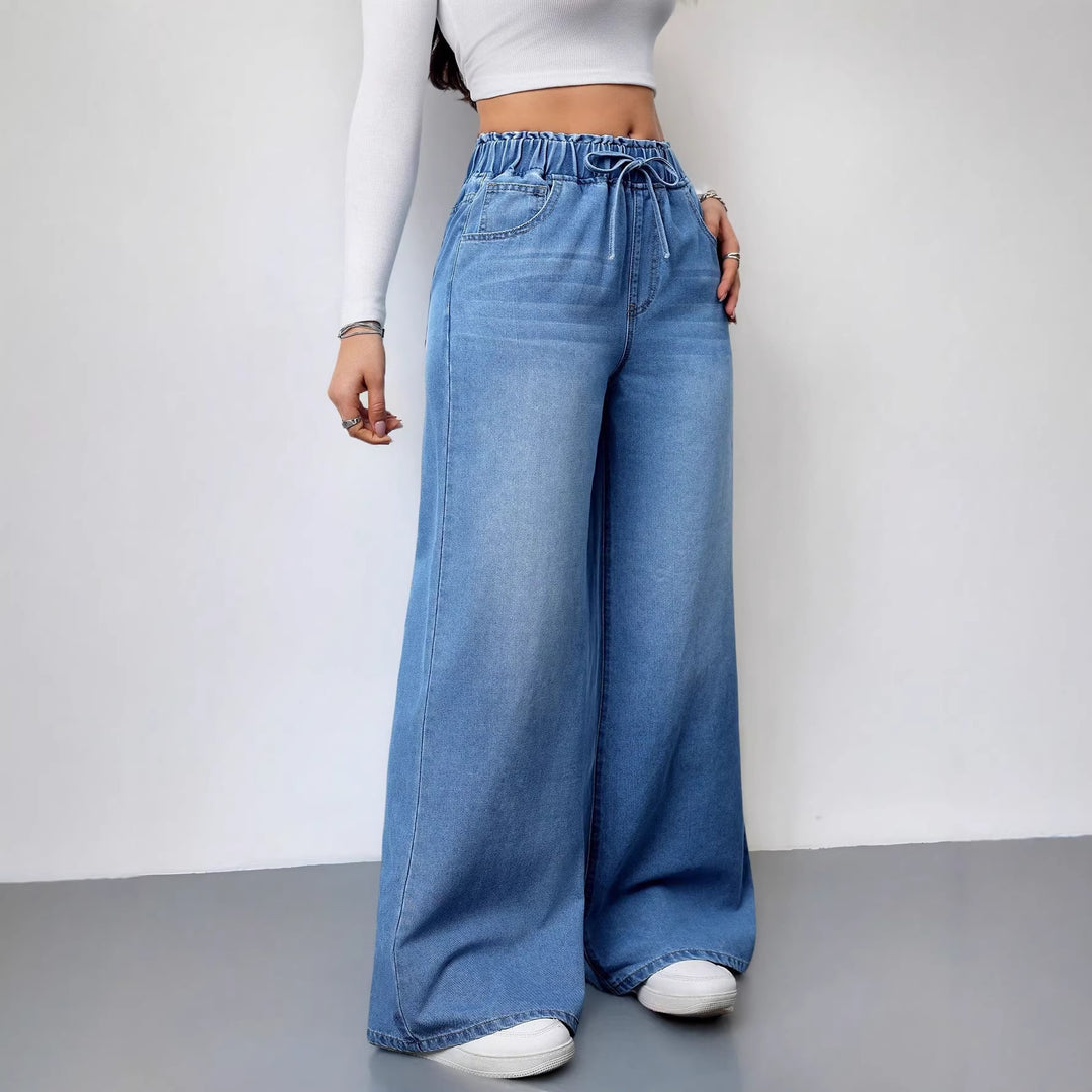 Kvinners vide denimbukser med elastisk midje og praktiske lommer