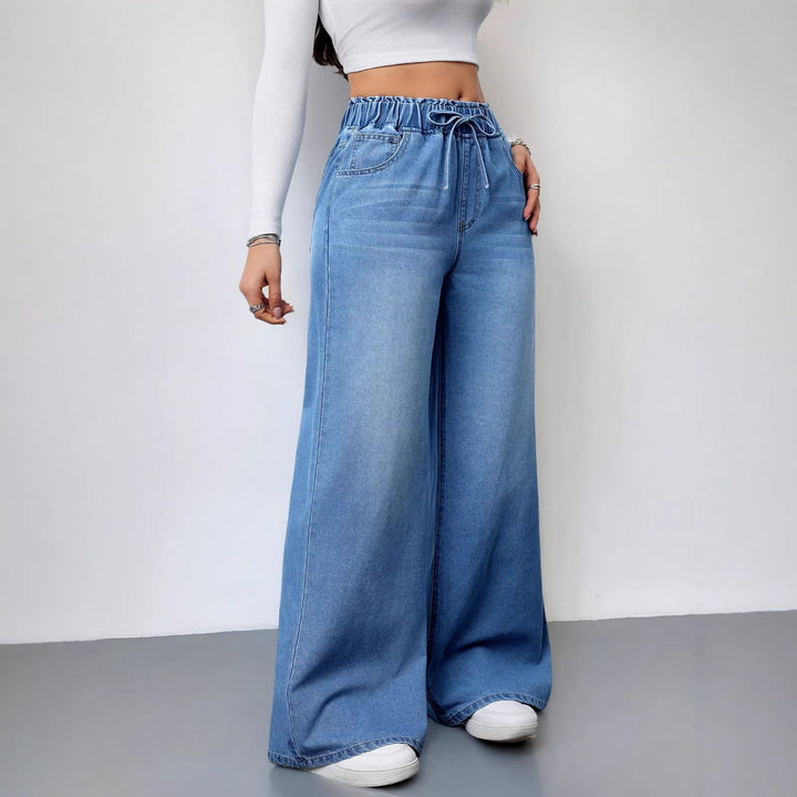 Kvinners vide denimbukser med elastisk midje og praktiske lommer