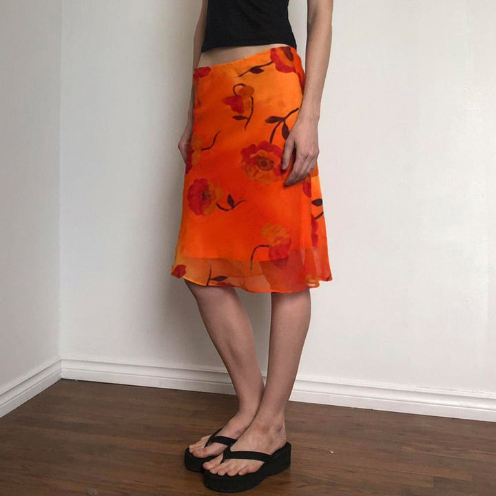 Ladies' airy maxi skirt with floral design Skjora
