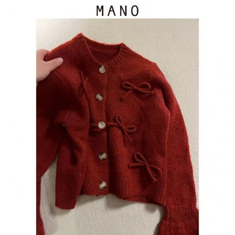 Dame cardigan med dekorative sløyfer på