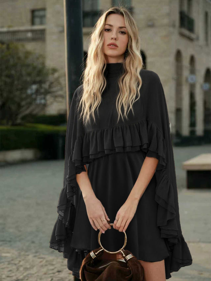 Dame Elegant rynkedress med høy hals og flytende snitt Skjora