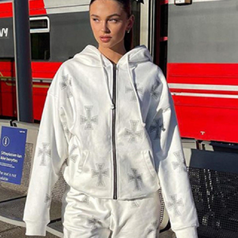 Dame joggebukser med stilige kors-emblemer og elastisk linning Skjora