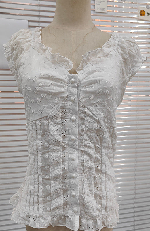 Damebluse med romantisk volangdesign og dekorative knappe detaljer Skjora