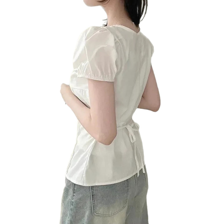 Dame Elegant bluseoverdel med ruffle-detaljer og figurtilpasset silhuett Skjora