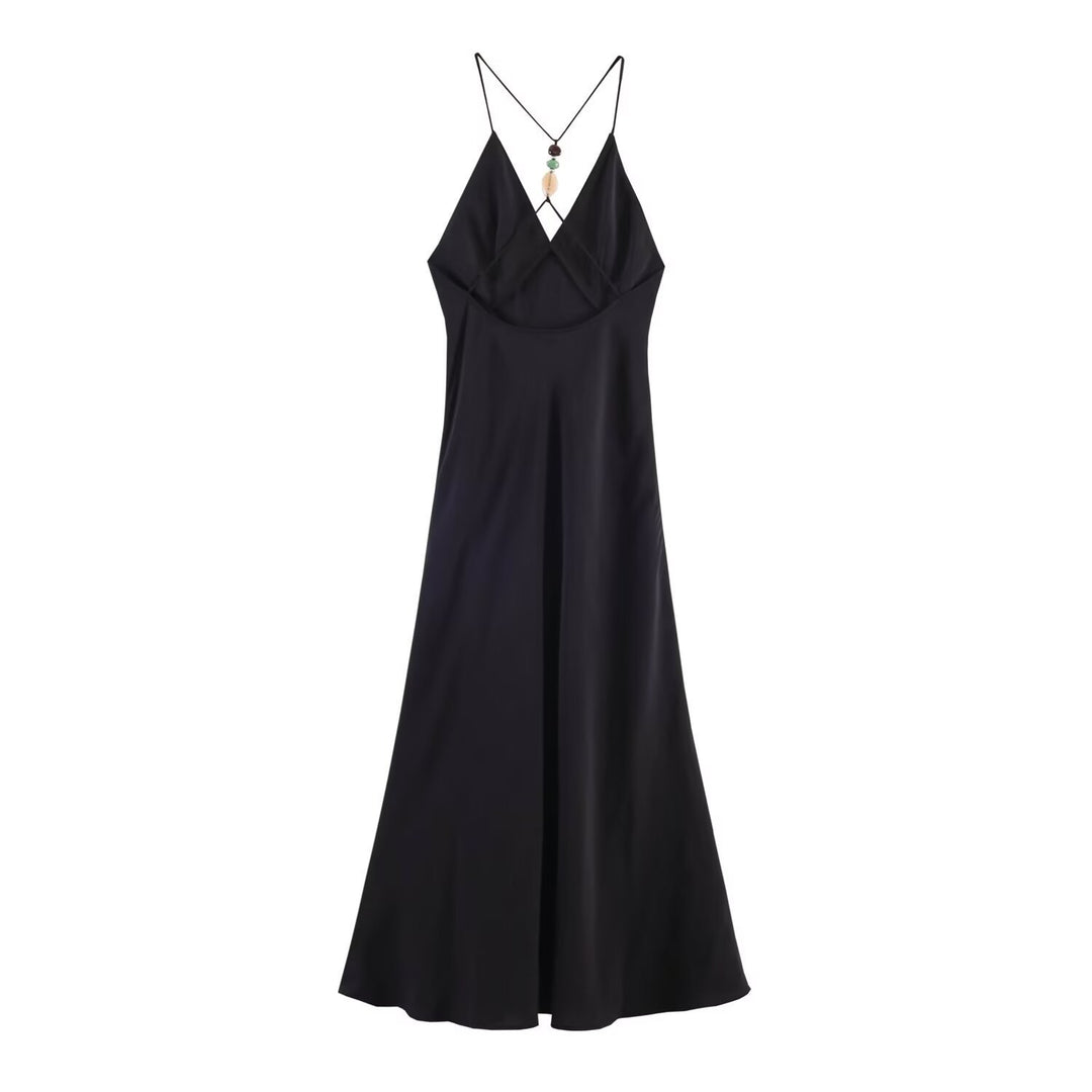 Dame Maxikjole med delikat spaghetti stroppdesign og elegant drapering Skjora