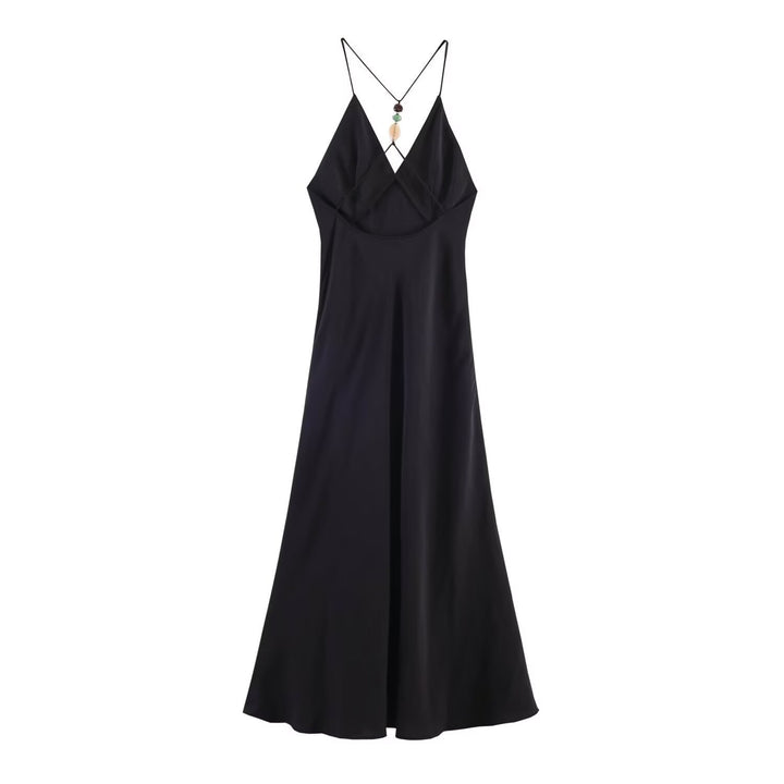 Dame Maxikjole med delikat spaghetti stroppdesign og elegant drapering Skjora