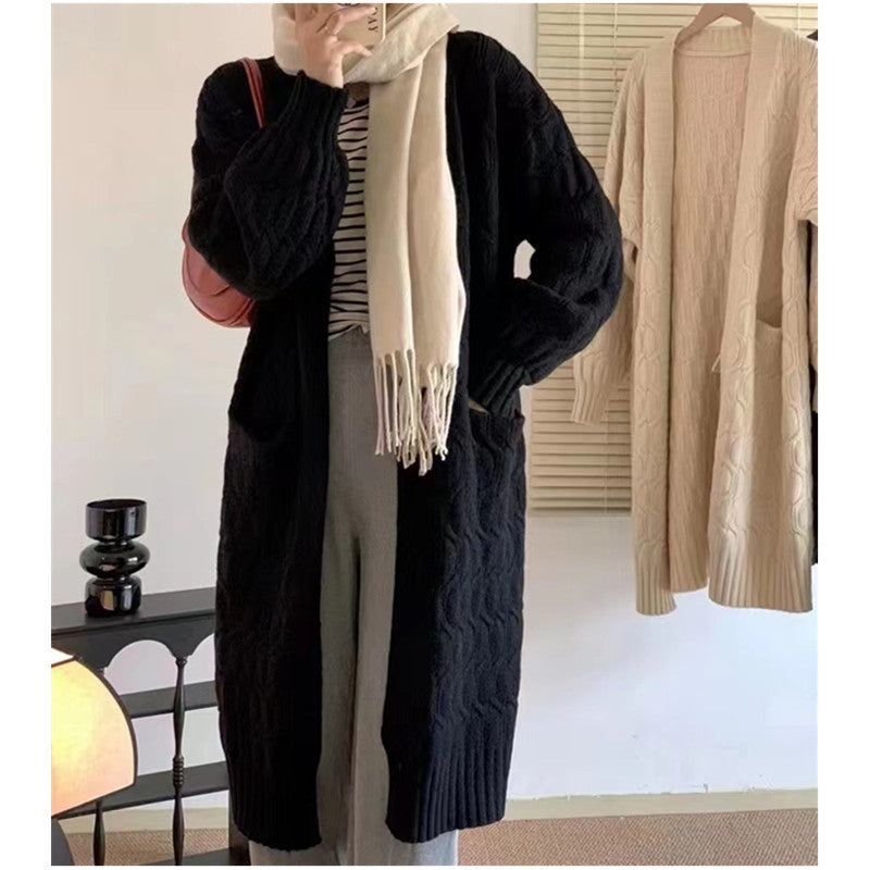Kvinnelig chunky strikket cardigan med lommer og V-hals Skjora