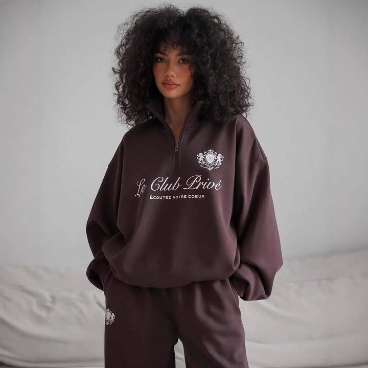 Dame avslappet genser med halvlukking og eksklusivt trykk Skjora