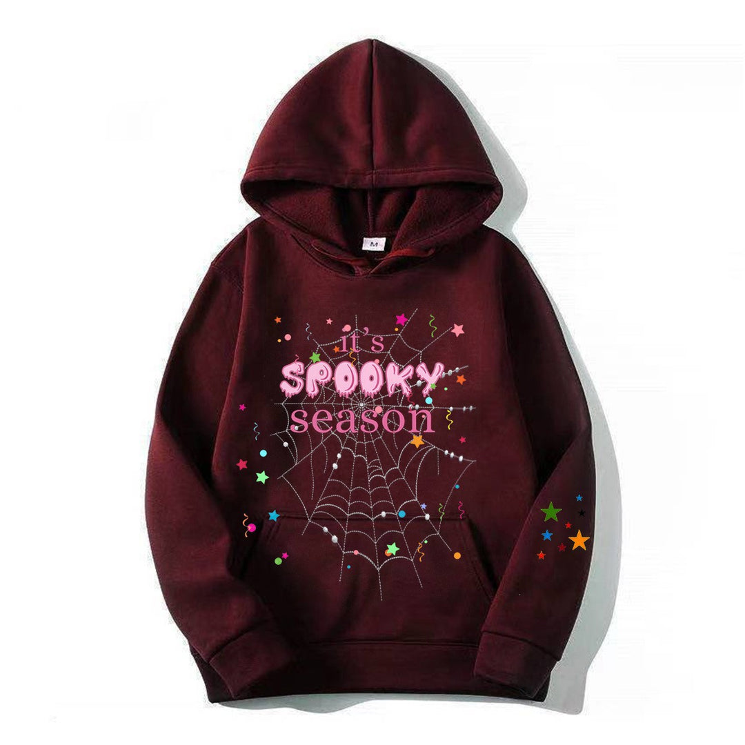 Damer koselig hettegensere med grafisk Halloween-design Skjora